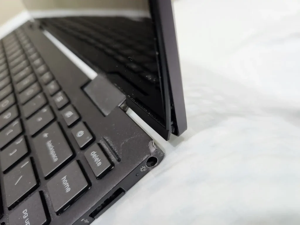 Broken hinge that requires HP Laptop Hinge Repair